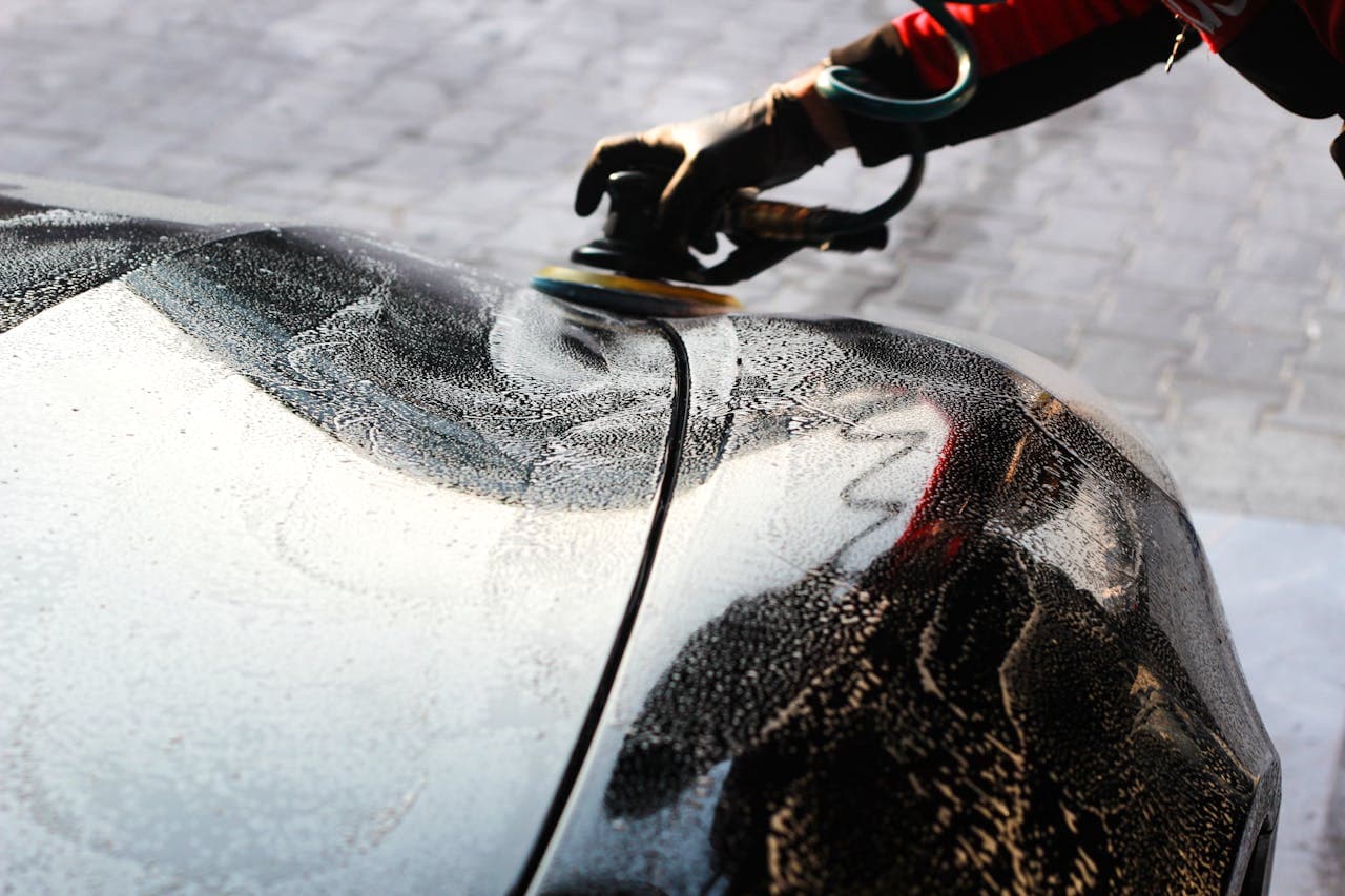 Professional polishing car hood with machine
